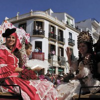 Damas Goyescas en su carruaje a la entrada a la plaza.