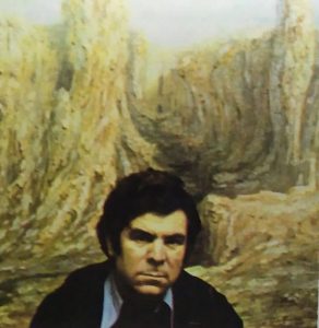 Imagen del pintor en su juventud con uno de sus cuadros.